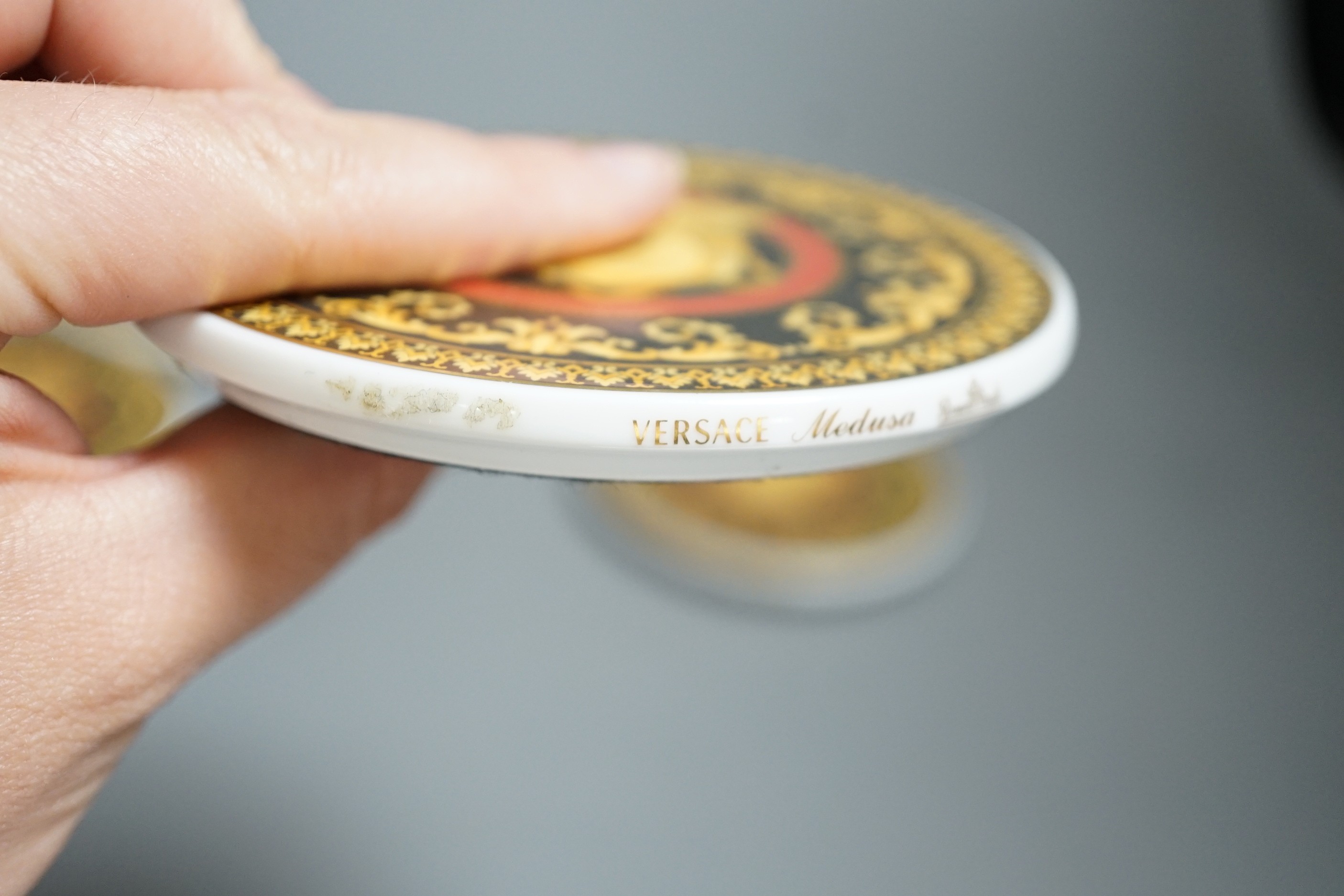 Rosenthal for Versace. A Medusa pattern set of eight coasters, 9cm